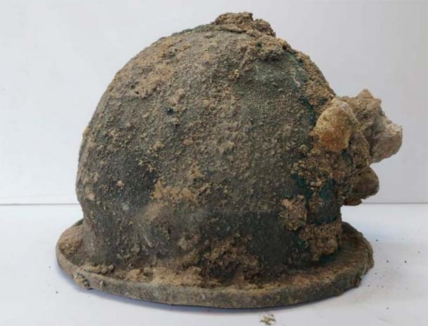 Ancient Greek helmet discovered in Italy at the site of sacrifices to Athena (photo)