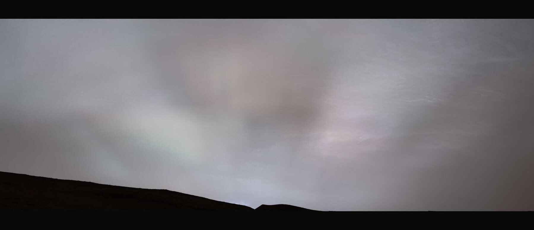 NASA's Curiosity rover captured these ''sunbeams'' shining through the clouds at sunset on February 2, 2023, the 3730th Martian day