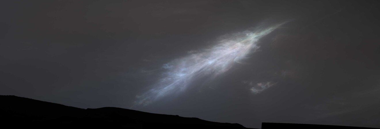 This feather-shaped rainbow cloud was captured just after sunset on January 27, 2023, the 3724th Martian day, or sol, of the Curiosity mission