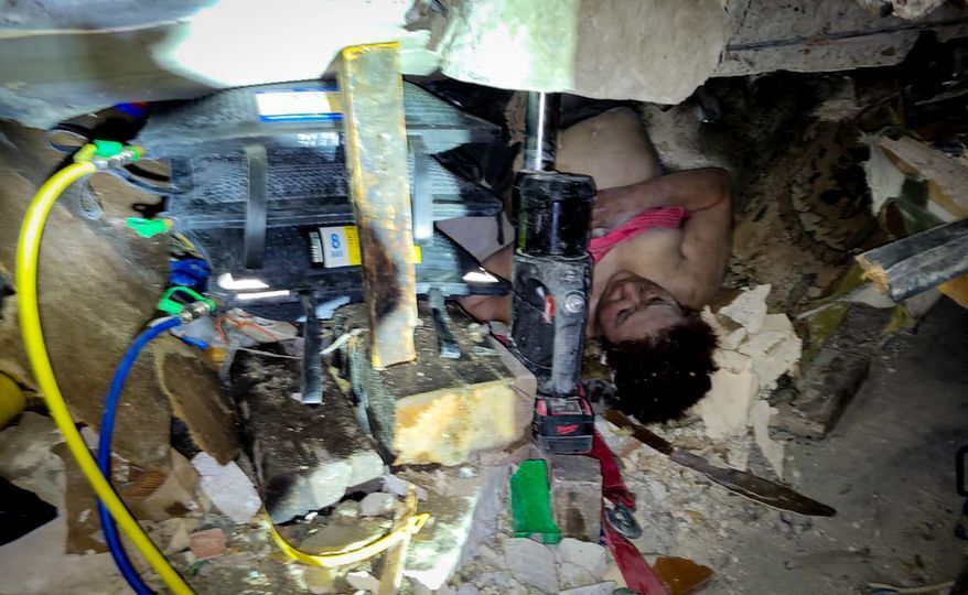 A woman was rescued from the rubble