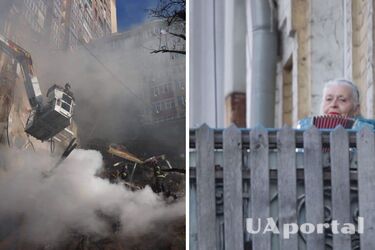 'Душу та тіло ми положим за нашу свободу': жінка на балконі зіграла гімн України після атаки на Київ (відео)