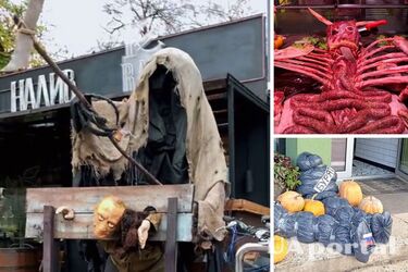 Столичные заведения украсили 'мертвыми оккупантами' и путиным в клетке