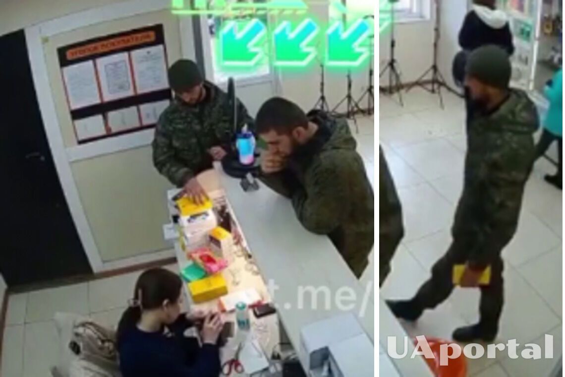 российский военный украл телефон на глазах продавца