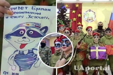 У російському Кемерово ОМОН вигадав дивну акцію для дітей, яких розмалювали під вкраденого єнота та дали зброю