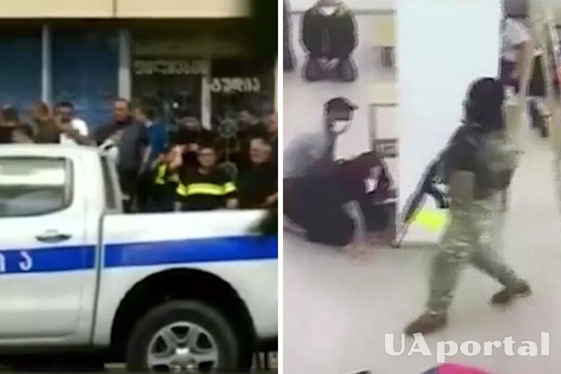В грузинском городе Кутаиси преступник захватил заложников в банке и требует выкуп и флаг россии