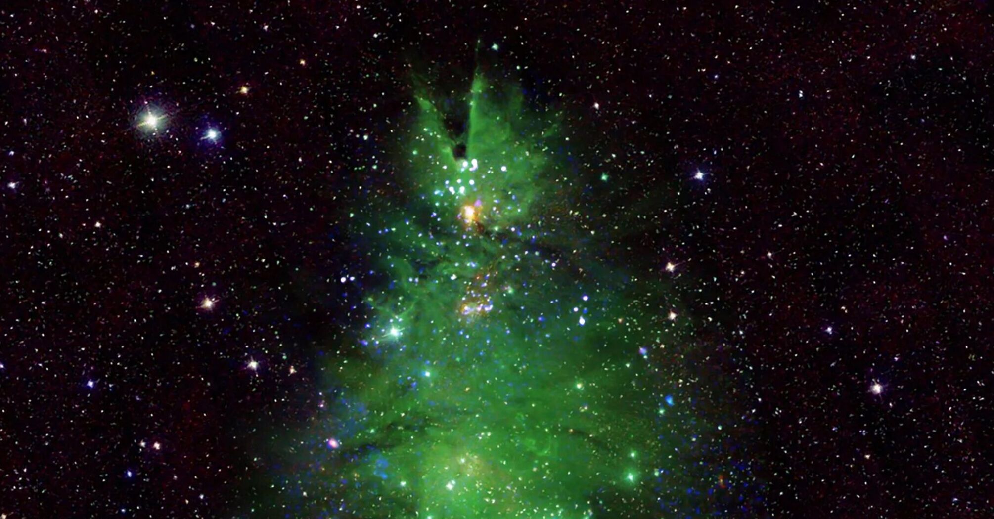 Різдвяну ялинку помітили у космосі: у NASA показали скупчення зірок (фото та відео)