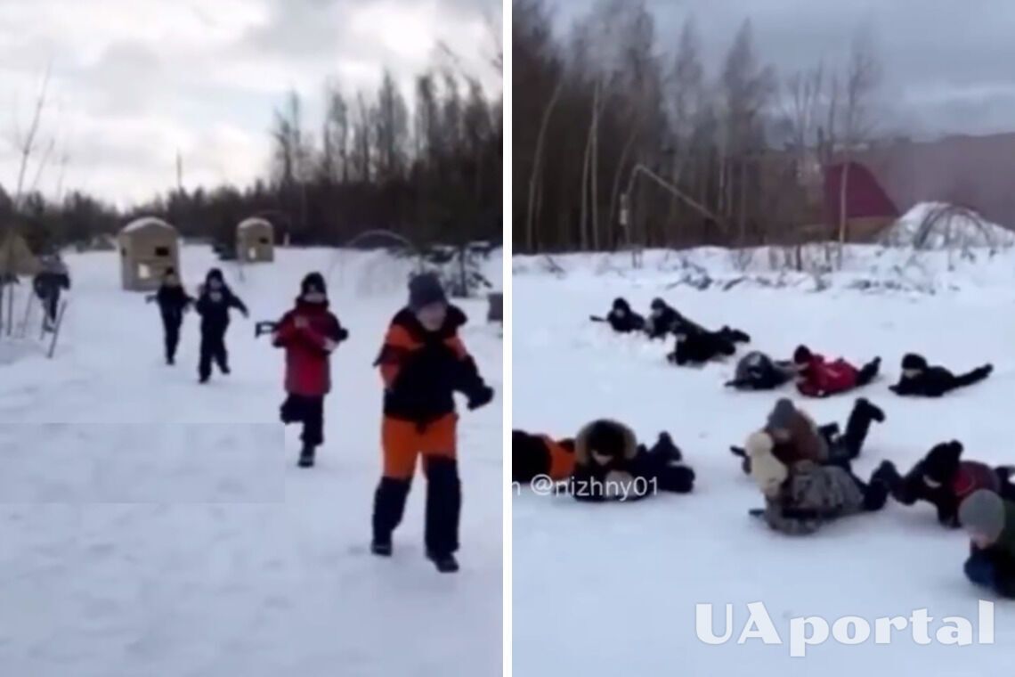 Бігали та повзали по снігу зі зброєю у руках: з'явилися кадри патріотичного виховання малолітніх дітей на росії