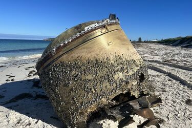 Mysterious metal object washes up on Australian beach