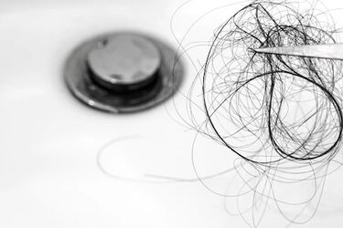 Что сделать, чтобы слив ванны не забивался волосами